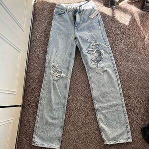 Pacsun women’s distressed light wash jeans size 23. Never worn with tags